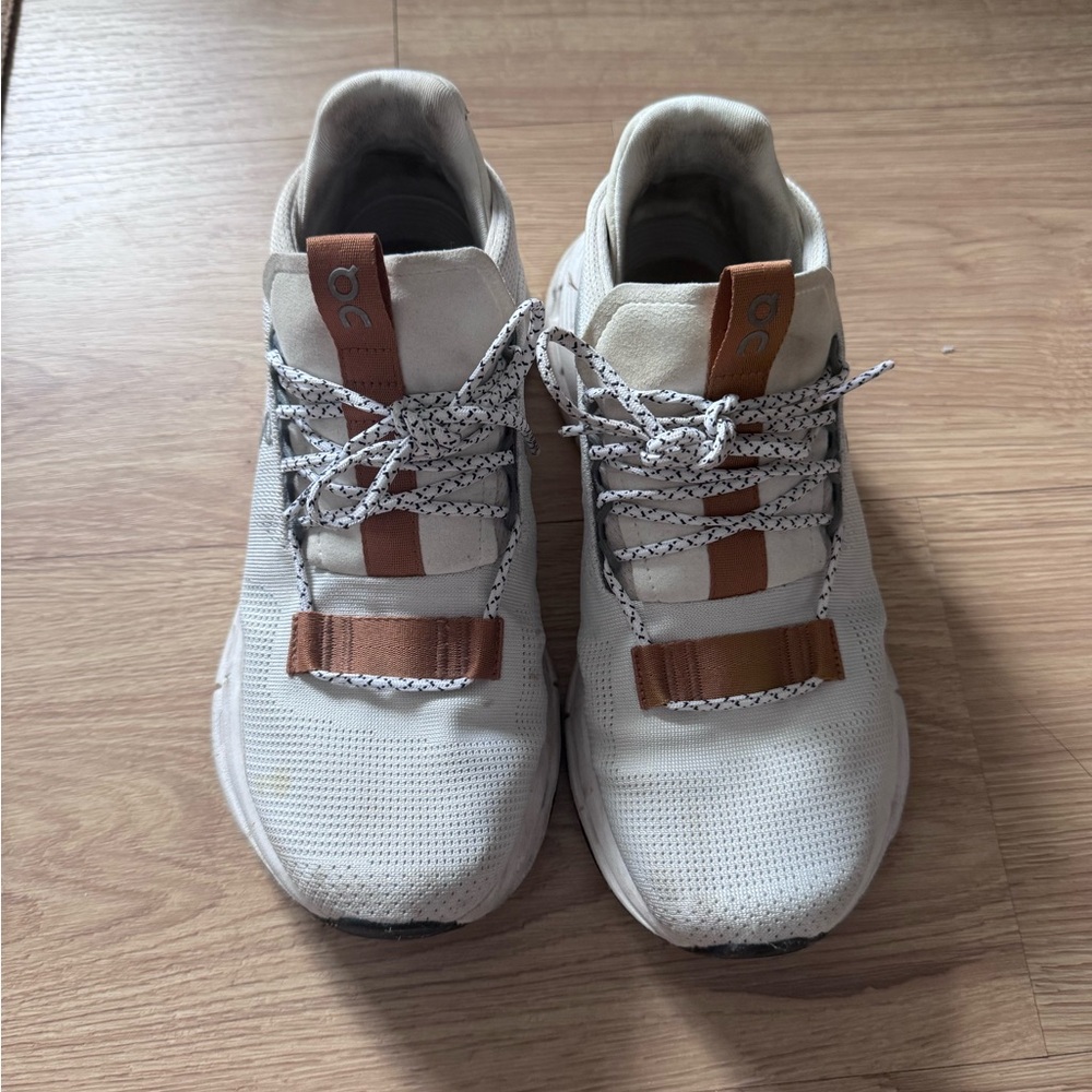 On Running Cream and Tan Sneakers